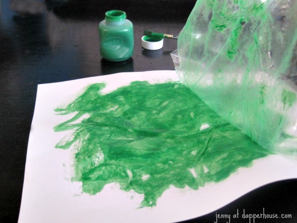 lift the clear plastic wrap up from the paint to see the design it leaves Eric Carle style @dapperhouse