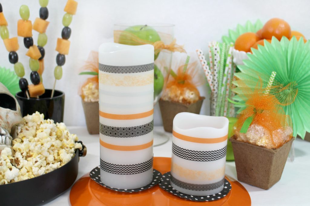 learn how to make these washi tape halloween candles and throw a healthy Halloween party with jenny at dapperhouse blog